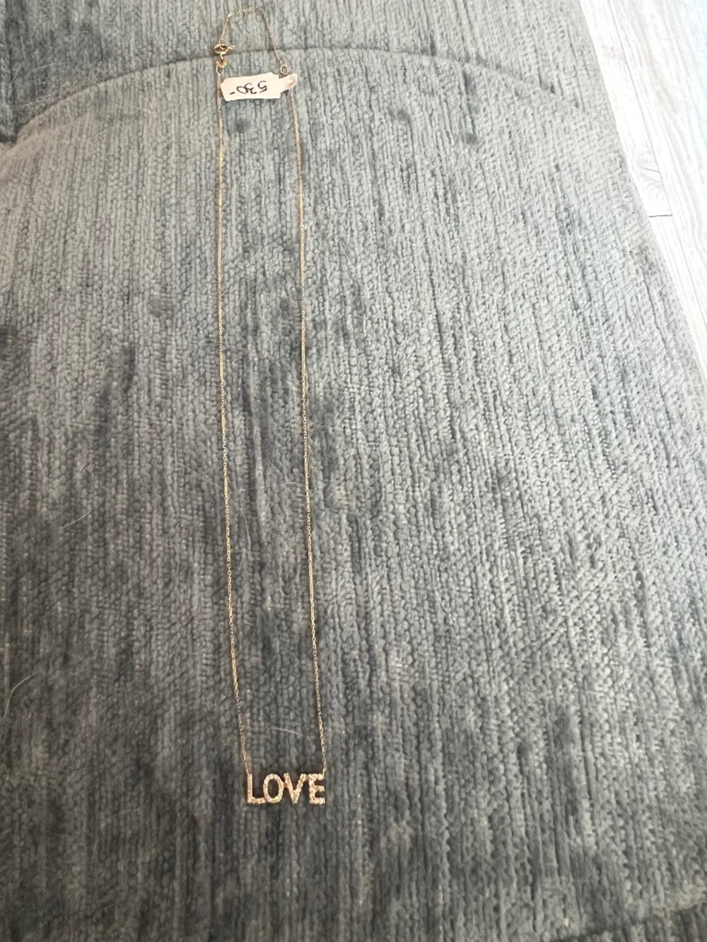 14 karat yellow gold and diamond "Love" necklace